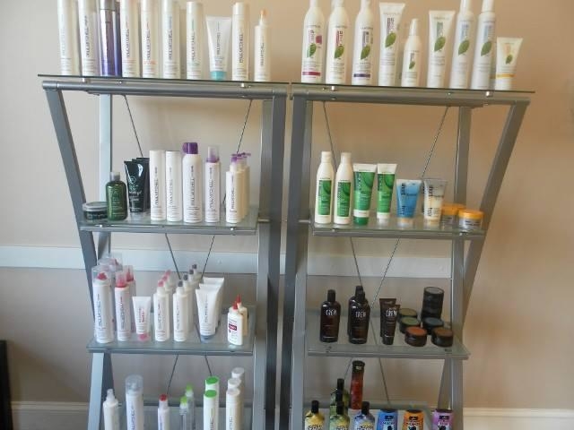 Shelves of professional hair-care retail products at Family Cuts & More